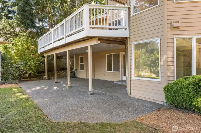 The lower level features a covered patio with French door entry, providing a charming and private access point to the ADU or spacious rec room.