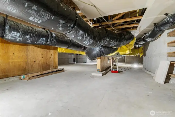 2,500 sq ft, 5 ft tall crawlspace finished with cement flooring, power, lights and utilities access