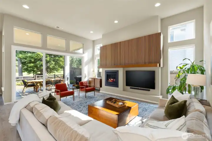 Custom Mantle in the great room. All the natural light!