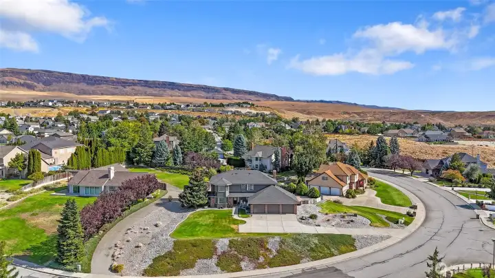 Enjoy the larger lot sizes on Grad Ave - everyone has just a bit more space