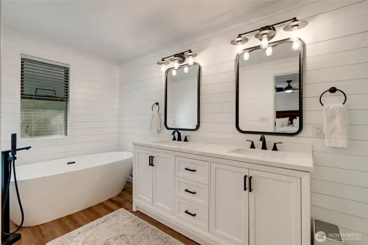 Double-vanity with soaking tub.