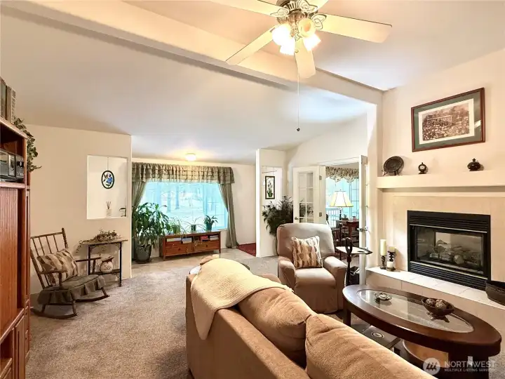 Formal Living Room with Double-Sided Propane Fireplace