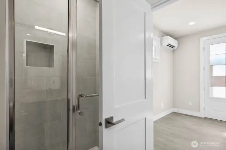 View from bathroom out to bedroom/office on lower level