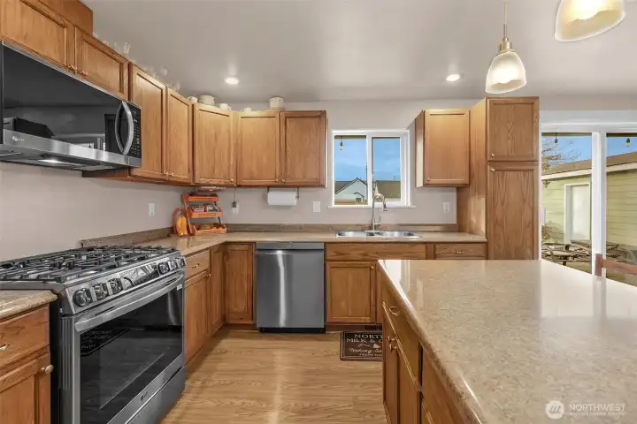 Modern kitchen with large island and stainless steel appliances