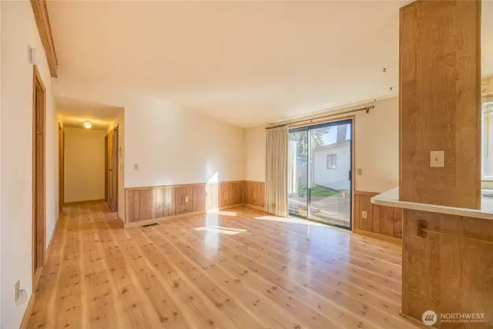 Just off the kitchen this area would make a great family room or office space.