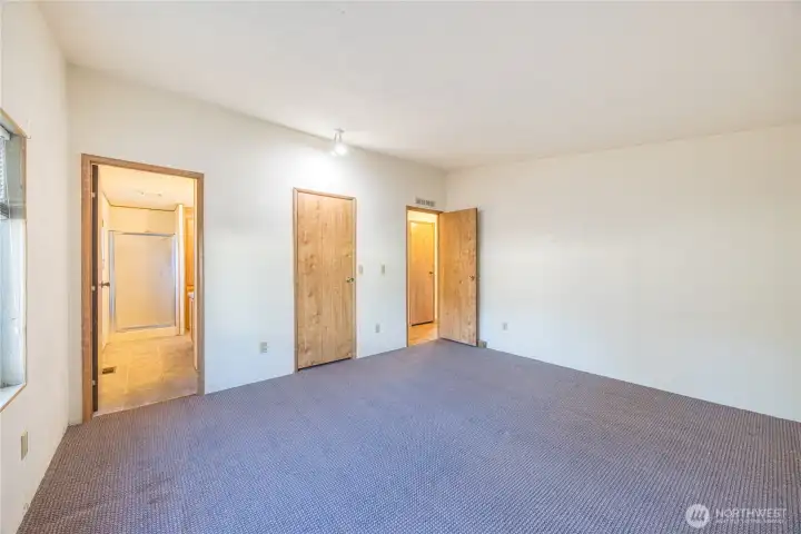 The primary bedroom is at the back of the home where it's most quiet.