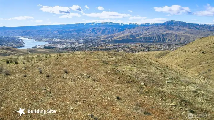 Prime building site positioned to capture sweeping mountain and river views in every direction.