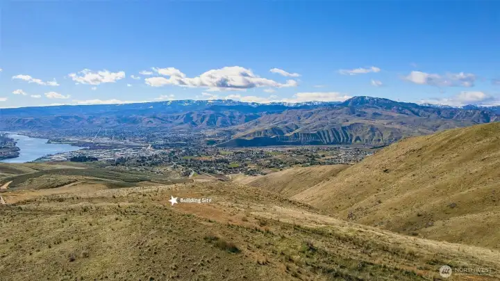 Elevated acreage offering unmatched privacy with wide-open views of Wenatchee and surrounding hillsides.