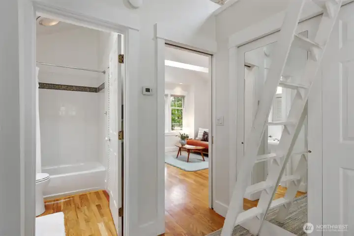 Full bath attached to bedroom is light and bright.