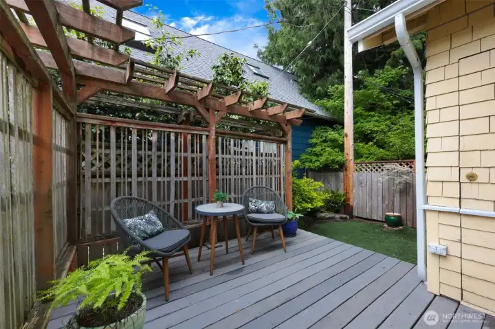 A rarity within this community (only 1 of 2 units have a private backyard): this home has not one, but TWO private decks for you to enjoy.
