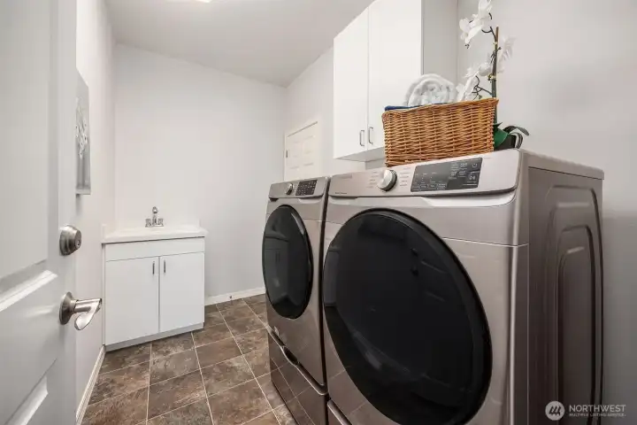 Laundry room with built-ins off the garage Laundry room with built-ins off the garage