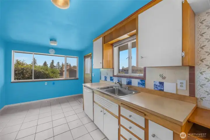 The kitchen is exactly what you expect from this era of home - cute and charming