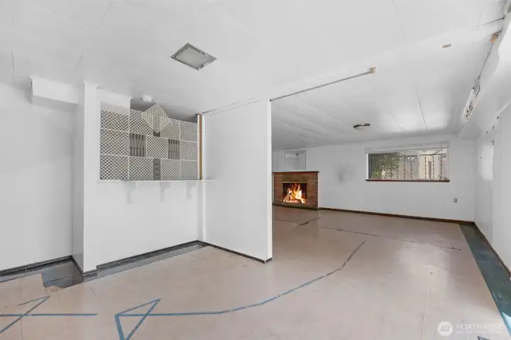 Downstairs has a family room area, and a bar area