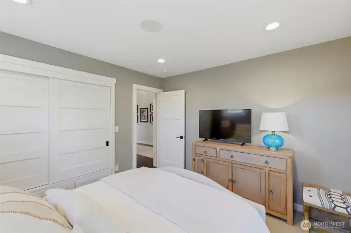 Guest bedroom with custom closet system Guest bedroom with custom closet system