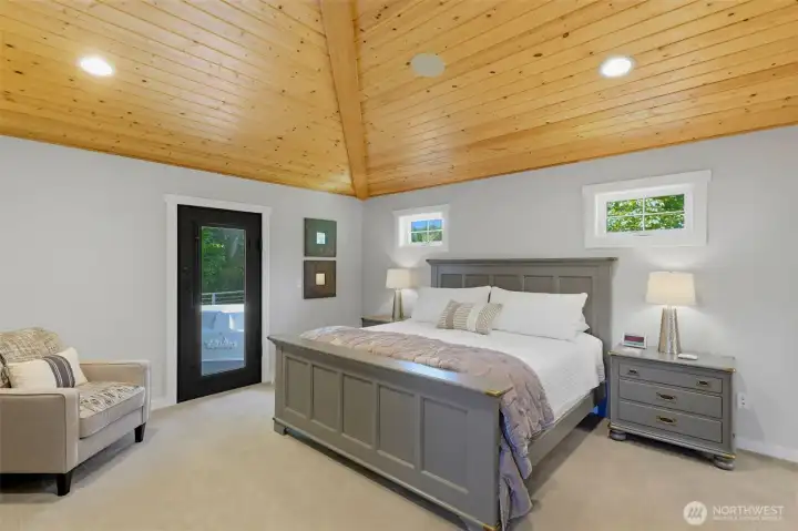 large primary bedroom with custom ceiling large primary bedroom with custom ceiling