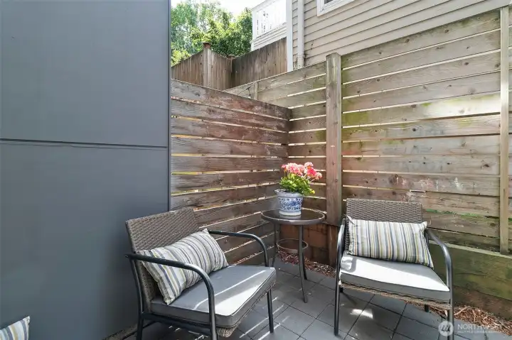 Private patio just outside the living room Private patio just outside the living room