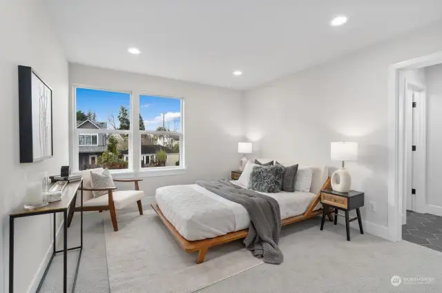 One of three extra bedrooms on top floor, this one with bath and walk in closet.