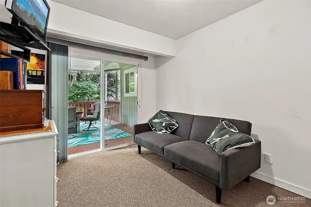 Third bedroom with access to back deck.