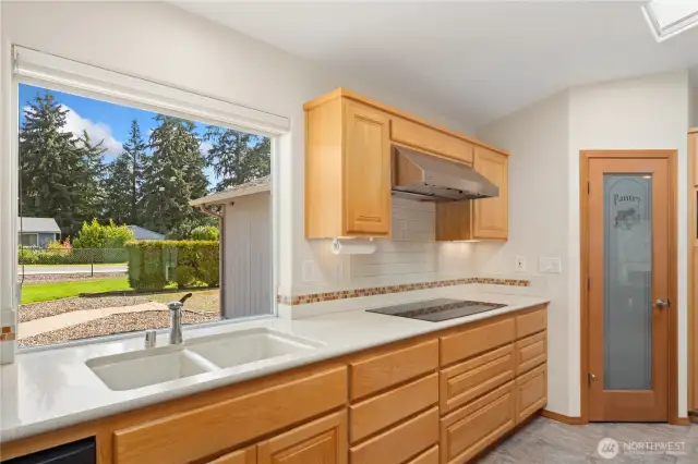 Large window in the kitchen lets in plenty of light.