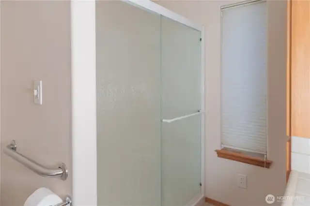Main bathroom features a walk-in shower.