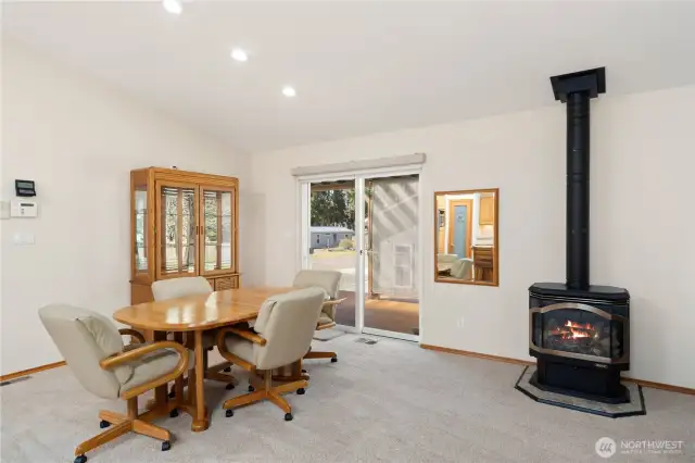 Looking from the dining room toward the sliding doors to the wrap around deck.