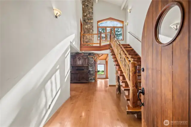 Soaring Ceilings, Wood, Stone and Views all Created on This Property~