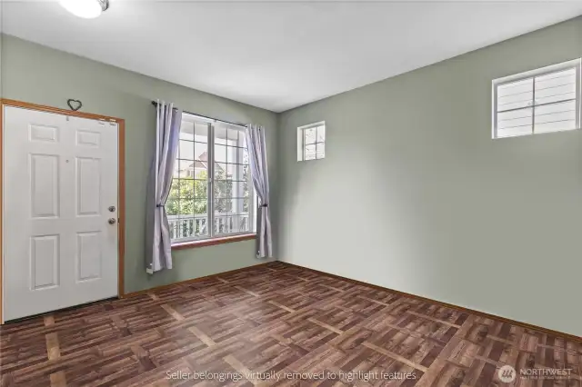 Showcasing tall ceilings, updated flooring and neutral paint colors