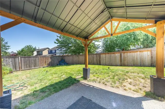 Covered gazebo interior showing outdoor entertaining potential