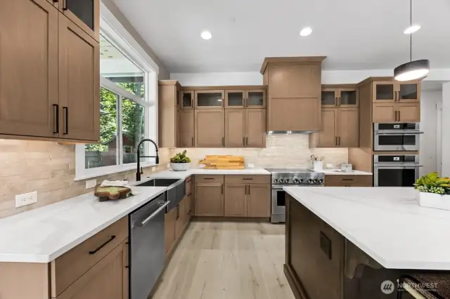 Quartz counters and rich Huntwood cabinets.