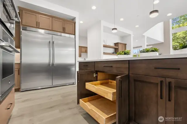 Plenty of storage throughout this kitchen. Pull out shelves for easier access.