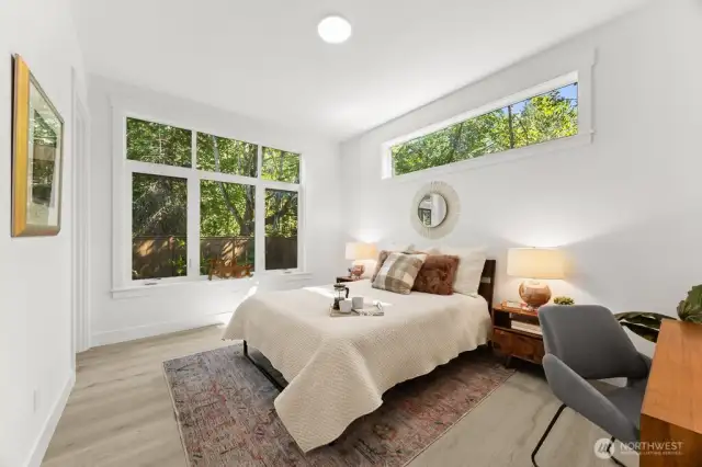 Another main floor bedroom #5, with private bathroom. Perfect guest space!