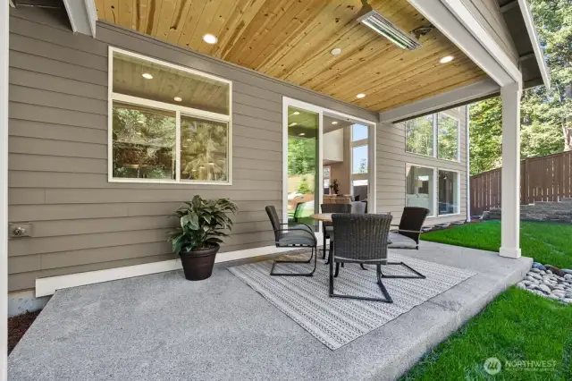Double slider and covered patio with mounted heater to enjoy year around.