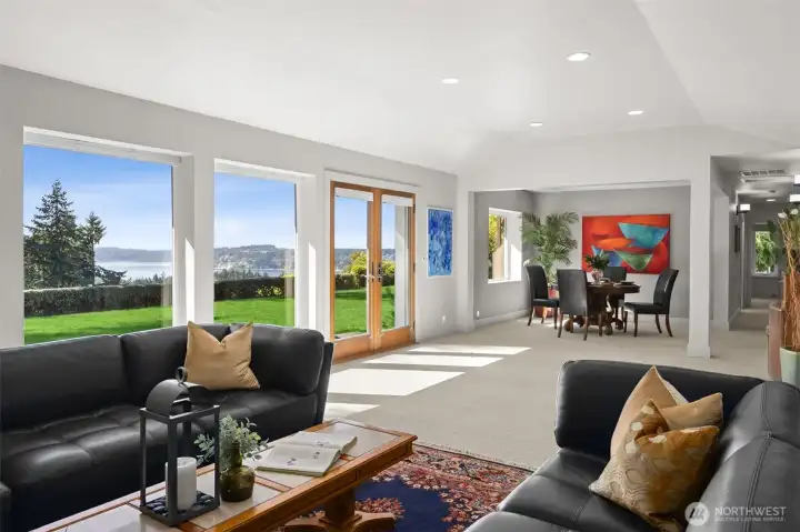 Open concept living and dining - along an IMAX of windows!