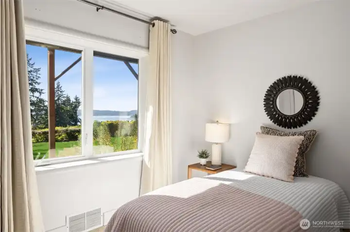 Bedroom #2 is on view side, with built-ins for convenience