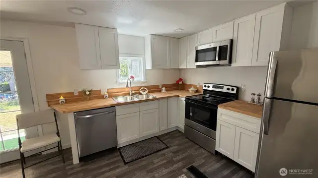 Brand new cabinets! New dishwasher and microwave.