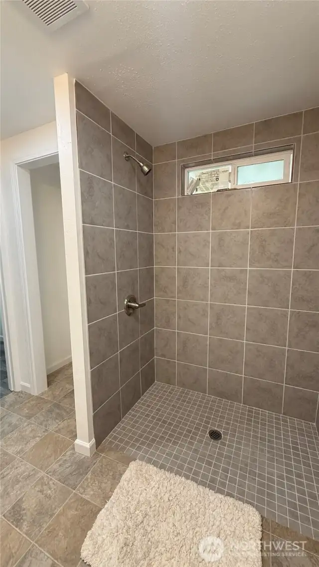 New tile in both bathrooms