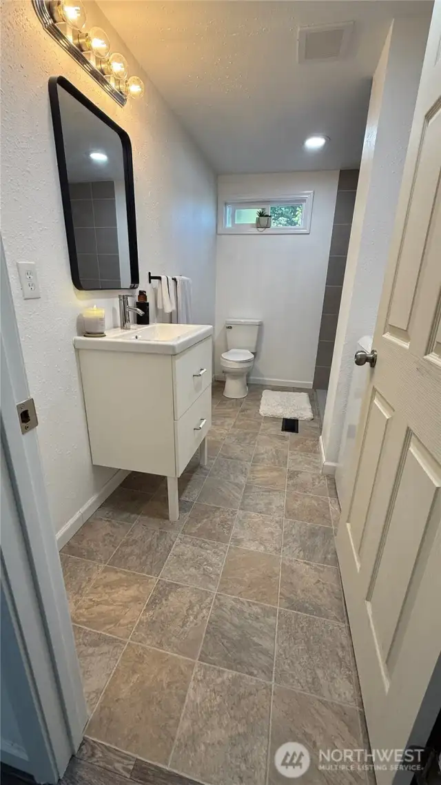 The Main bathroom has a shower too.