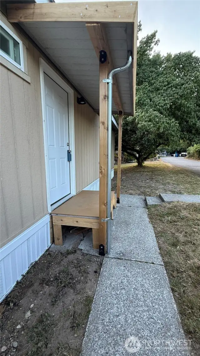 Renewed front covered porch.