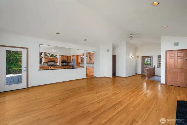 Beautiful hardwood flooring flows from entry through Great Room, kitchen and hallways.