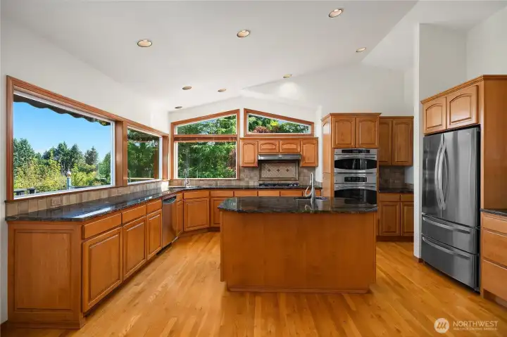 Abundant cabinetry, granite countertops and stainless steel appliances are sure to please.