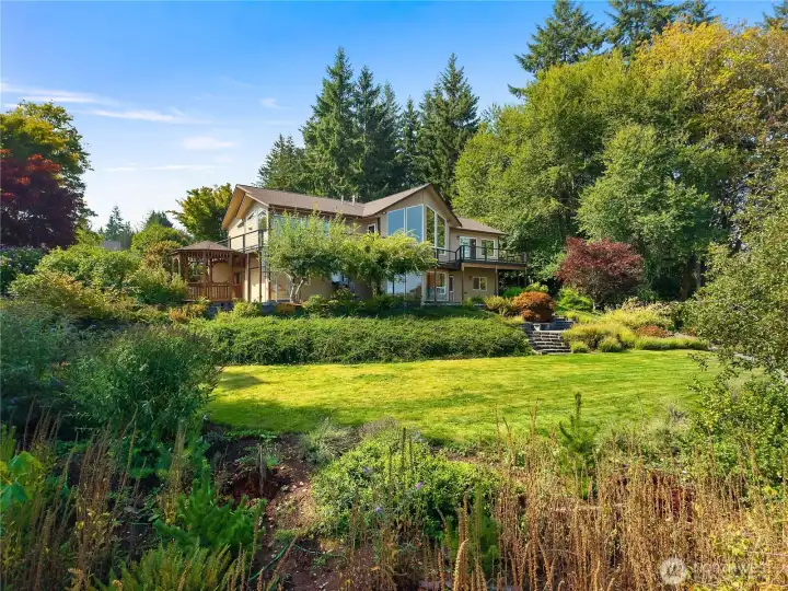 Expansive deck wraps around home. Perfect for entertaining!