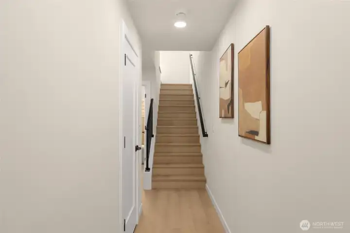 Stairway provides great separation between private downstairs room and upper floors