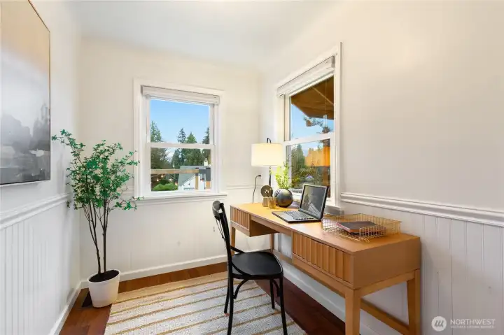 Located off of the kitchen, use as a breakfast nook or office space