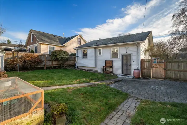 fully-fenced in back yard
