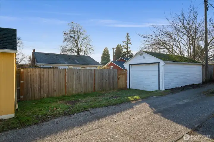 additional parking outside of the garage via they alley.