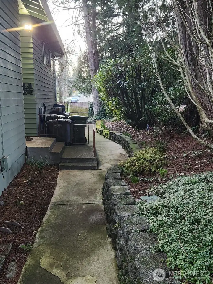 front yard leads to a path