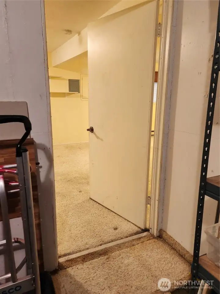 large room downstairs has a direct door to the garage