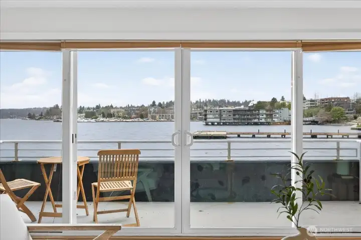 Private balcony just off the living room, offering sweeping views across Lake Washington and the perfect setting to relax and enjoy the waterfront