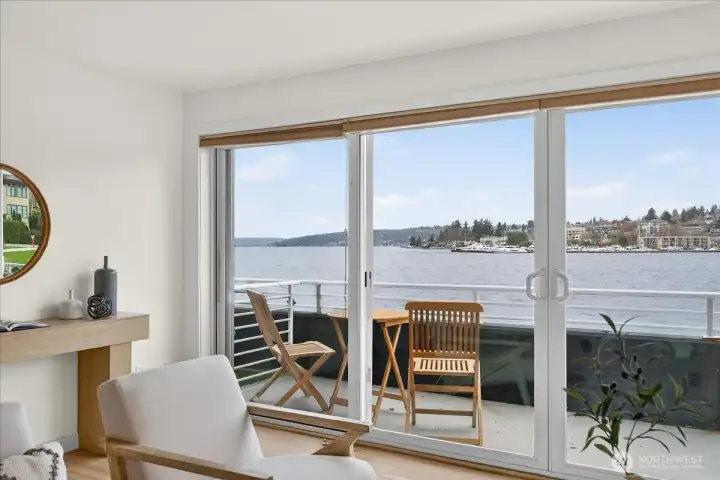 Private balcony just off the living room, offering sweeping views across Lake Washington and the perfect setting to relax and enjoy the waterfront