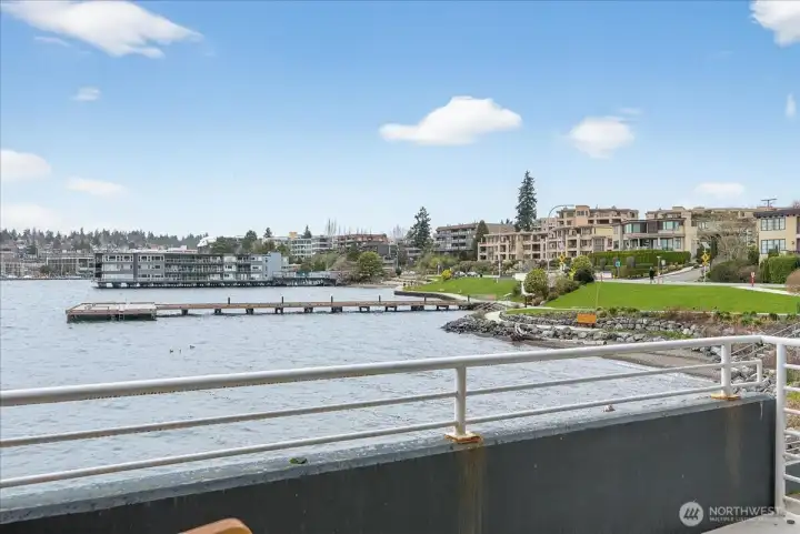 Views of David Brink Park and Pier from the private balcony, showcasing the vibrant waterfront setting along Lake Washington